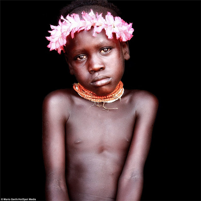 Photographer spends seven years taking intimate portraits of African tribes 