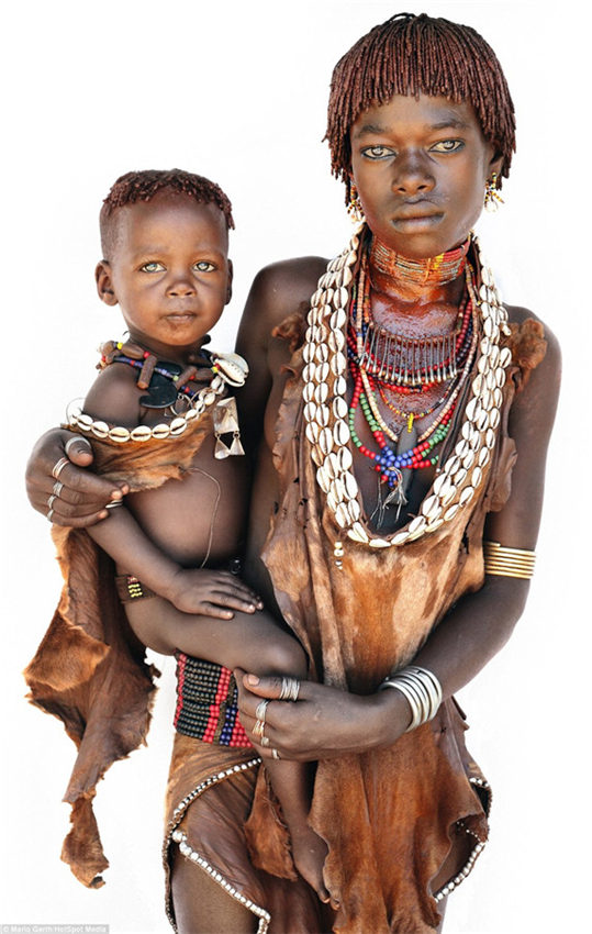 Photographer spends seven years taking intimate portraits of African tribes 