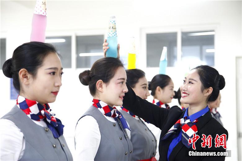 Future stewardesses take 'acrobatic' training 