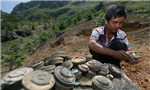 Villagers living near Vietnam border are still haunted by war’s legacy