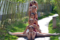 Charming dancing students pose for graduation photos