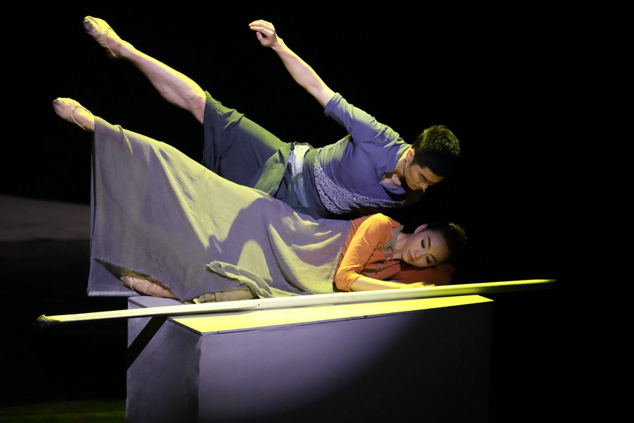 Modern dance performance represents human relationships