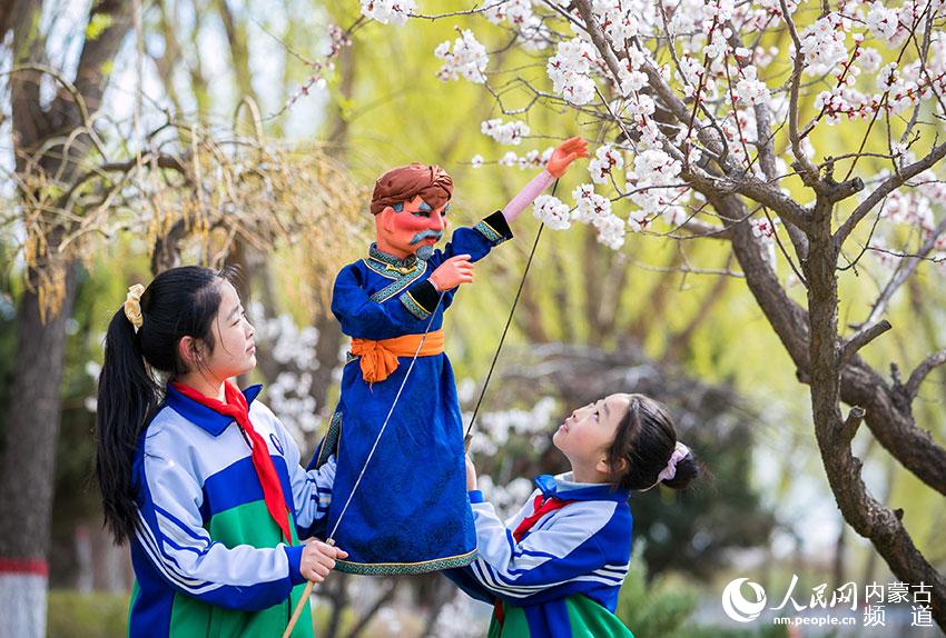 In pics: Pupils learn rod puppet skills in N China