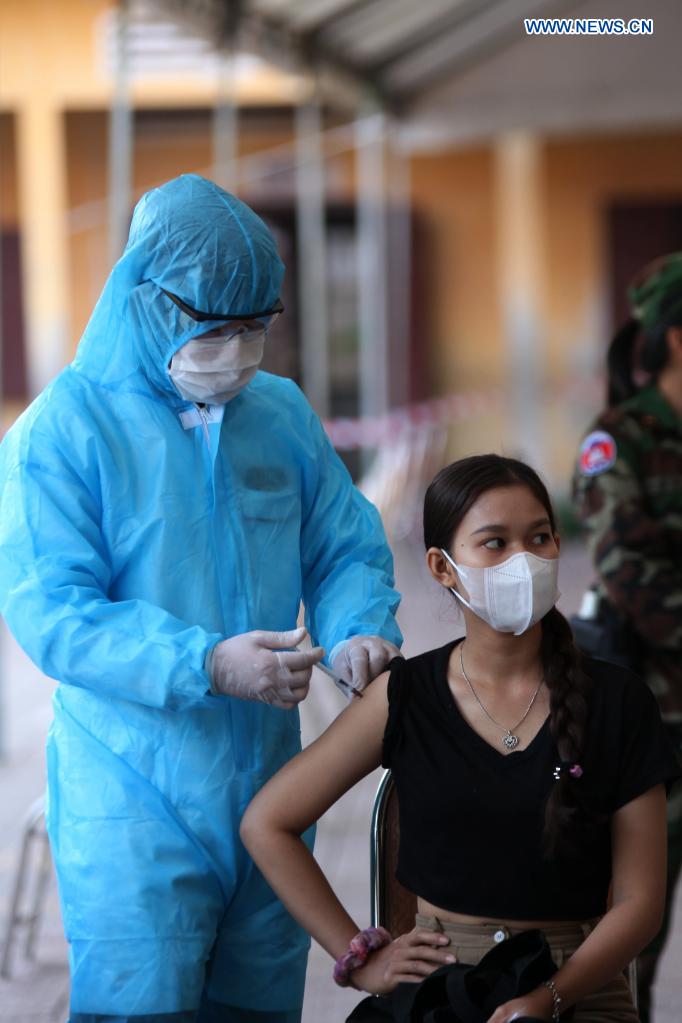 People receive Chinese COVID-19 vaccines in Phnom Penh, Cambodia