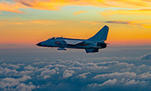 Fighter bombers fly through clouds