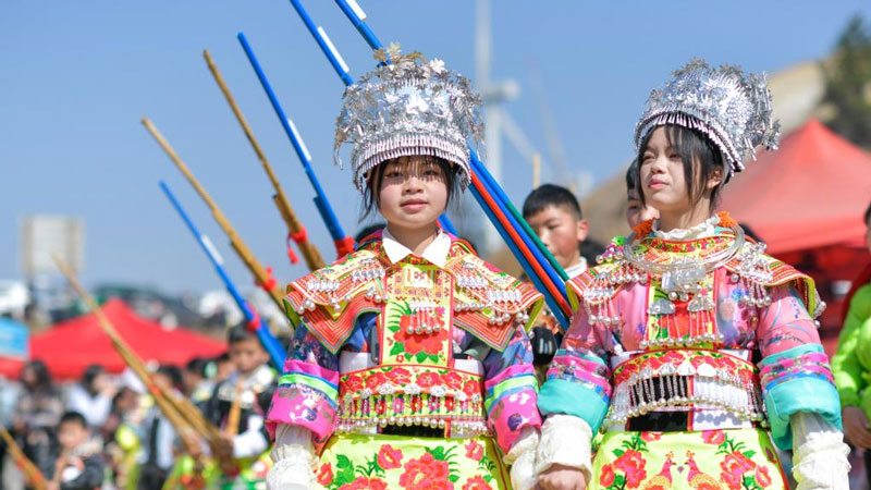 Miao people participate in traditional dancing activity in SW China's Guizhou