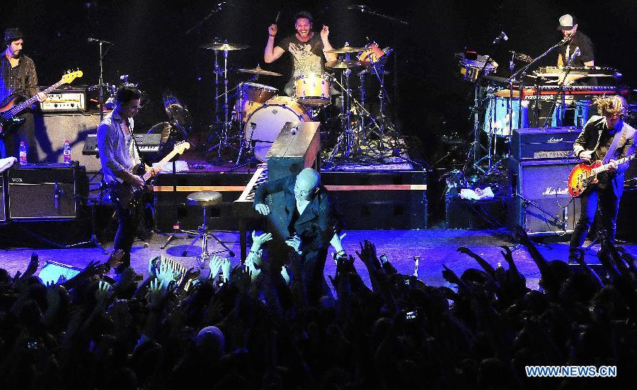 American piano rock band "The Fray" performs in a concert at Tango Club in Beijing, capital of China, Nov. 14, 2012. The band was formed in 2002 and featured by the use of the piano as the lead instrument in their music. (Xinhua/Xiao Xiao)