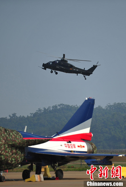 A WZ-10 attack helicopter flies at the Airshow China 2012 on Nov. 14, 2012. WZ-10, nicknamed China’s “Apache”, is the most advanced attack helicopter of the PLA and also the most expected Chinese aircraft at the Airshow China 2012. (Chinanews.com/Ke Xiaojun)