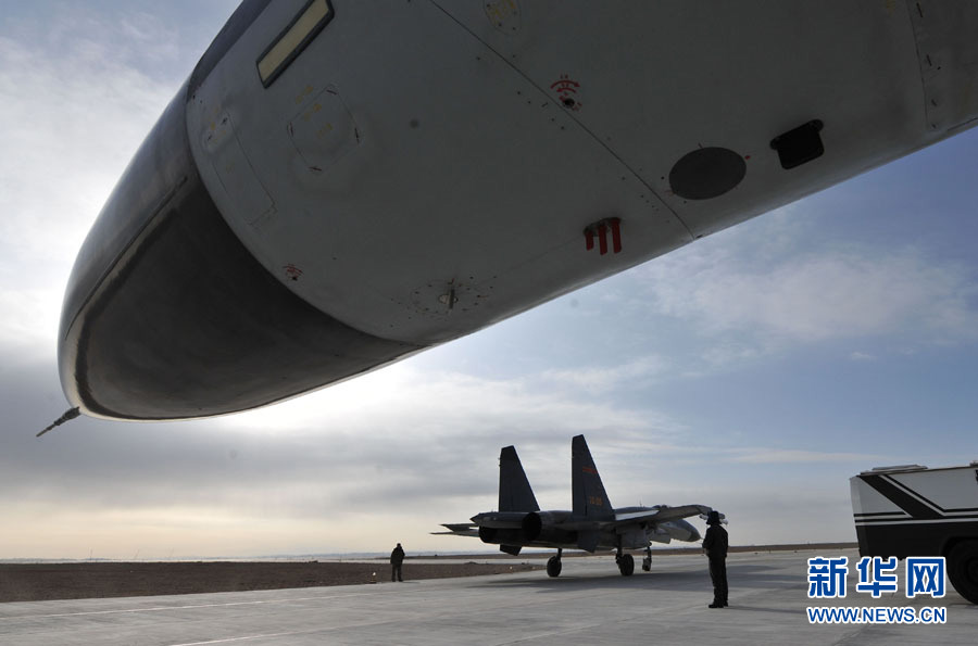 More than 100 top pilots from 14 aviation brigades and regiments of the Air Force of the Chinese People's Liberation Army (PLA) pilot their fighters to conduct an air combat confrontation training at an experimental training base of the PLA Air Force in northwest China. (Xinhua/Yu Hongchun)