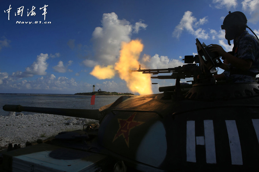 A tank company under a maritime garrison command of the Chinese People's Liberation Army (PLA) stationed on the Sansha Island conducts a live-ammunition shooting training with tank-mounted anti-aircraft machine gun, in a bid to temper troops' combat capability. (navy.81.cn/Chen Xianling, Liu Weiping)