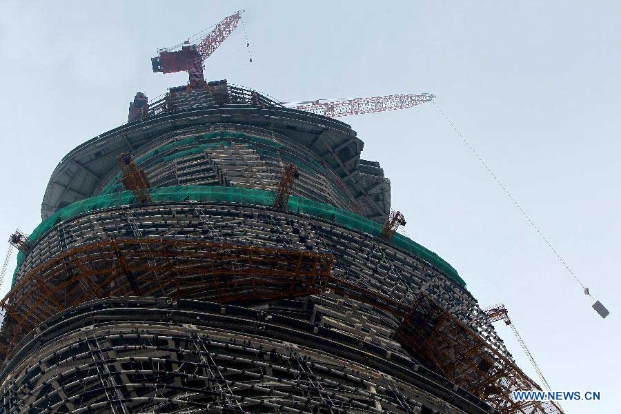 Photo taken on Dec. 8, 2012 shows the Shanghai Tower, a skyscraper under construction, in Pudong, east China's Shanghai Municipality. The Shanghai Tower is expected to reach 632 meters in height and start service in 2015. (Xinhua/Pei Xin)