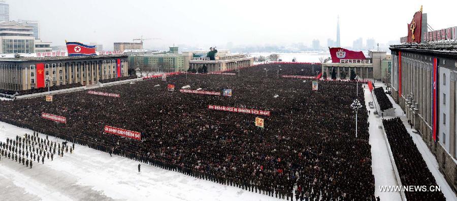 This photo provided by KCNA on Jan. 5, 2013, shows citizens of Pyongyang vowing to implement what top leader Kim Jong Un has urged in his New Year address in Pyongyang, the Democratic People's Republic of Korea (DPRK). Kim Jong Un urged his people to build the country into an economic giant in his New Year address on Tuesday. (Xinhua/KCNA) 