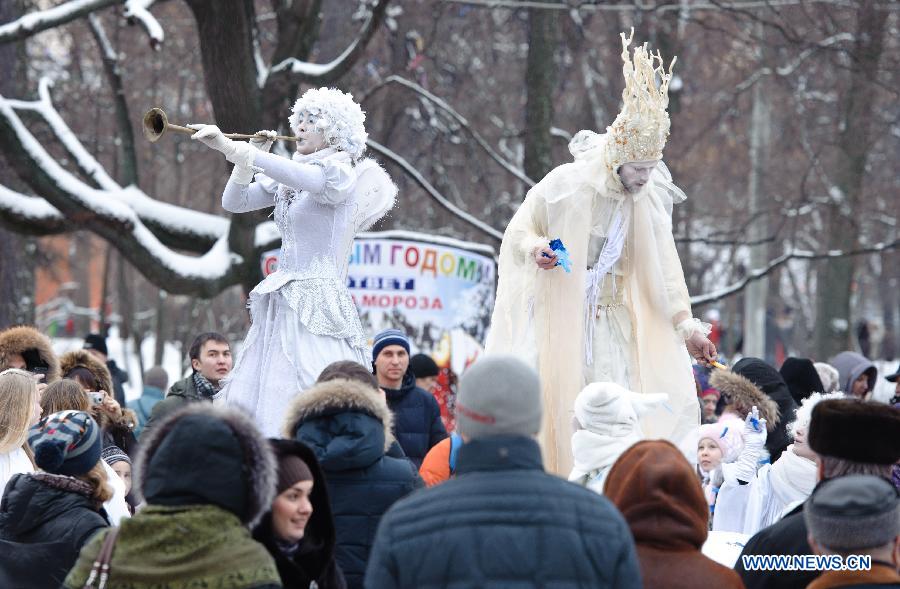 An actor and an actress perform during a celebration on Orthodox Christmas at Sokolniky Park of Moscow, capital of Russia, on Jan. 7, 2013. Church services took place across Russia from Sunday to Monday to mark the Orthodox Christmas, with thousands of people attending ceremonies to celebrate the holiday. In accordance with the Julian calendar which was introduced by Julius Caesar in 45 B.C., the Orthodox Christmas takes place on Jan. 7, 13 days after the Western Christmas. (Xinhua/Jiang Kehong) 