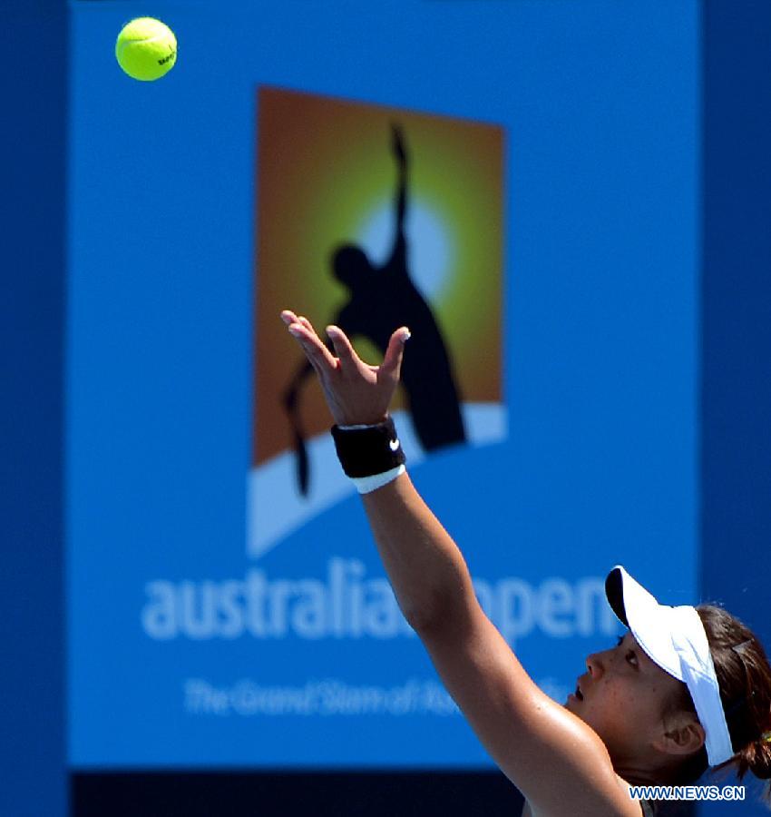 Zhou Yimiao of China serves during the first round of the women's qualifying singles match against Czech Republic's Eva Birnerova at the 2013 Australian Open tennis tournament in Melbourn, Australia, on Jan. 10, 2013. Zhou won 2-0. (Xinhua/Chen Xiaowei)