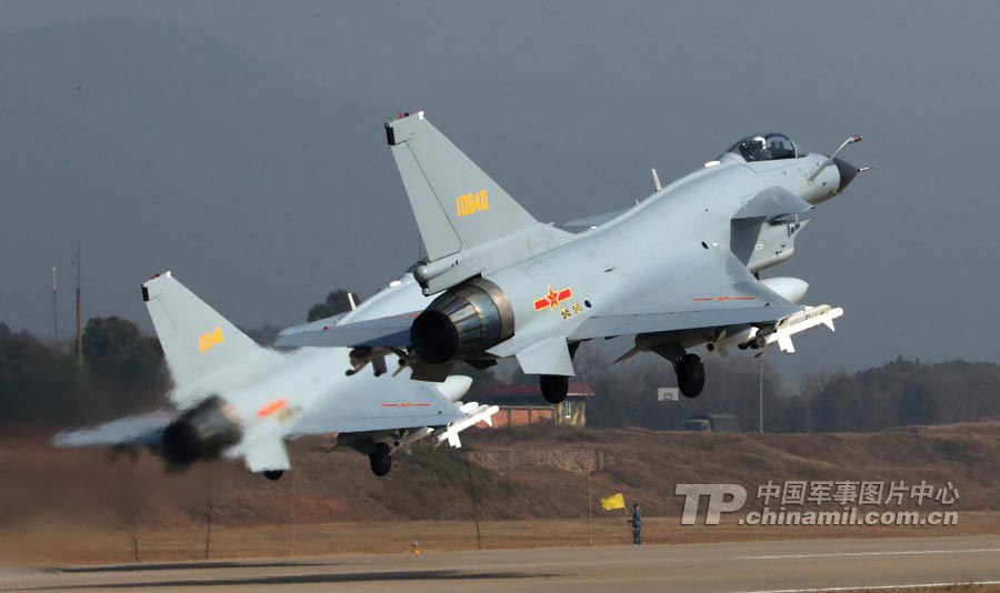 Two fighters of a regiment of the air force under the Nanjing Military Area Command (MAC) of the Chinese People's Liberation Army (PLA) took off emergently for combat readiness cruise on January 19, 2013. (chinamil.com.cn/Qiao Tianfu)