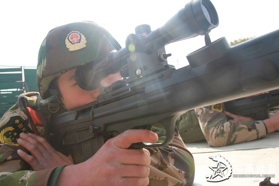 Snipers of the Huzhou Detachment under the Zhejiang Contingent of the Chinese People's Armed Police Force (APF) carry out military training before Spring Festival. (China Military Online/He Yuanhong, Wang Shichun)