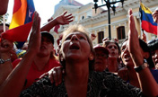 Supporters of Chavez celebrate his return