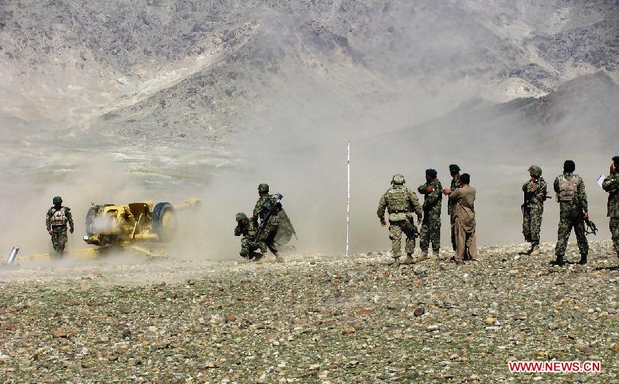 Afghan national army soldiers fire an artillery shell during a military exercise in Laghman province, east Afghanistan, on March 5, 2013. The Afghan government and NATO Training Mission in Afghanistan (NTM-A) have stepped up efforts to train and equip Afghan army and police to take over the full leadership of its own security duties. (Xinhua/Sapay)