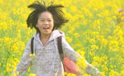 The sea of rape flowers, fairyland for children