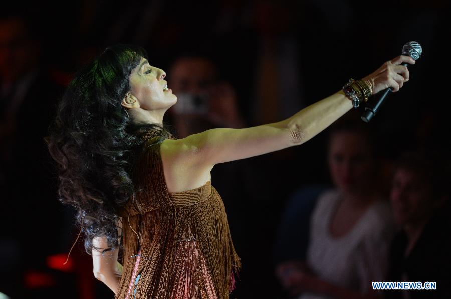 Musical artist Rita performs during her concert that is entitled as Tunes for Peace and sponsored by the Mission of Israel to the United Nations, at the General Assembly Hall of the United Nations headquarters, in New York, on March 5, 2013. Rita, an artist of Israel-Iranian heritage, sang in both Hebrew and Persian during the concert here on Tuesday. (Xinhua/Niu Xiaolei)