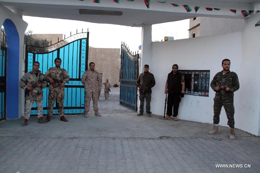 Photo taken on March 7, 2013, shows the entrance to the building of al-Assema TV channel in Tripoli, Libya, March 7, 2013. Unknown gunmen stormed the building of al-Assema TV channel in Libya Thursday afternoon, leaving four people kidnapped, witnesses told Xinhua. (Xinhua/Hamza Turkia) 