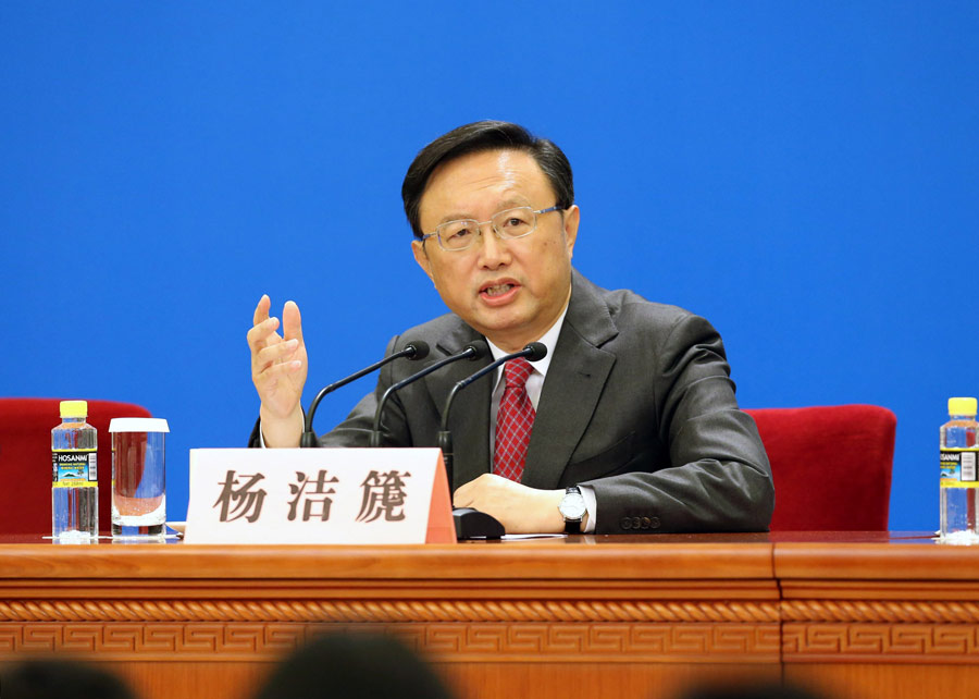 Former Chinese foreign minister Yang Jiechi answers questions during a news conference on the sidelines of the first session of the 12th National People's Congress (NPC) at the Great Hall of the People in Beijing, China on March 9, 2013. Yang was endorsed as the State councilor of China at the sixth plenary meeting of the first session of the 12th NPC. (Xinhua /Ding Lin) 