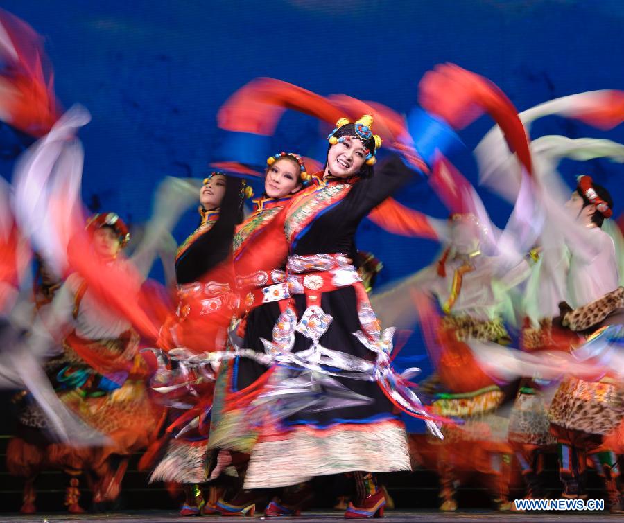 Artists perform during the opening ceremony of the "Tourism Year of China" in Moscow, March 22, 2013. The "China-Russia Tourism Year" program, which began last year with the "Tourism Year of Russia" in China, aims to foster tourism ties and humanistic exchanges between the two countries. (Xinhua/Jiang Kehong)