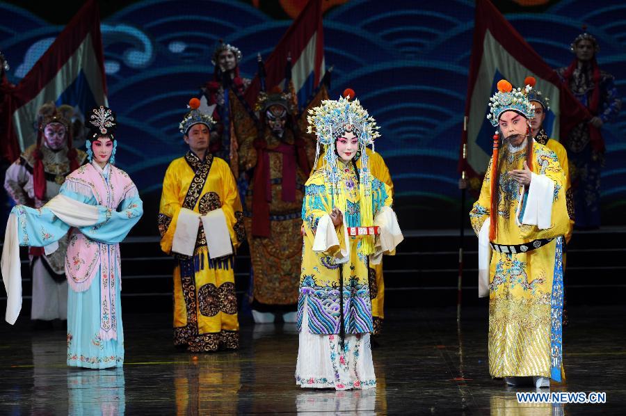 Artists perform during the opening ceremony of the "Tourism Year of China" in Moscow, March 22, 2013. The "China-Russia Tourism Year" program, which began last year with the "Tourism Year of Russia" in China, aims to foster tourism ties and humanistic exchanges between the two countries. (Xinhua/Jiang Kehong)