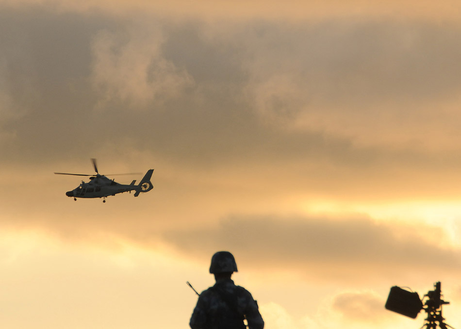 A sentry is on guard on the Chigua Reef of the South China Sea on March 24, 2013. (Xinhua/Bai Ruixue) 