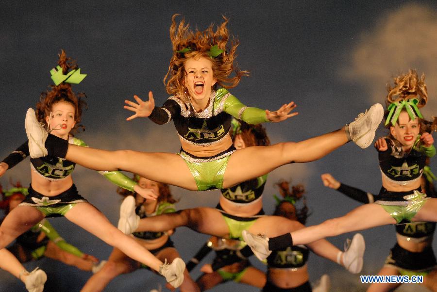 Cheerleaders compete during the 2013 Sea to Sky International Cheerleading Championship in Vancouver, Canada, on April 7, 2013. More than 3,500 athletes from 135 cheerleading teams competed for a chance to perform at the 2013 World Cheerleading Championship in Orlando, Florida, at the end of April 2013. (Xinhua/Sergei Bachlakov)