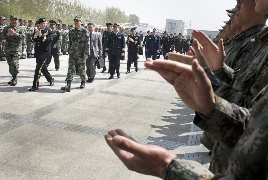 Gen. Martin Dempsey, the visiting chairman of the U.S. Joint Chiefs of Staff, visited the 4th Helicopter Regiment of the army aviation force of the Chinese People's Liberation Army (PLA), watched static display of the Mi-171 and the WZ-9 helicopters and viewed the flight performance of the WZ-10 and the WZ-9 helicopters on the morning of April 24, 2013. Afterwards, Gen. Dempsey successively visited the Army Aviation Force Academy of the PLA and the National Defense University (NDU) of the PLA and held discussions and exchanged views with the teaching and research staff and cadets representatives. (Xinhua)