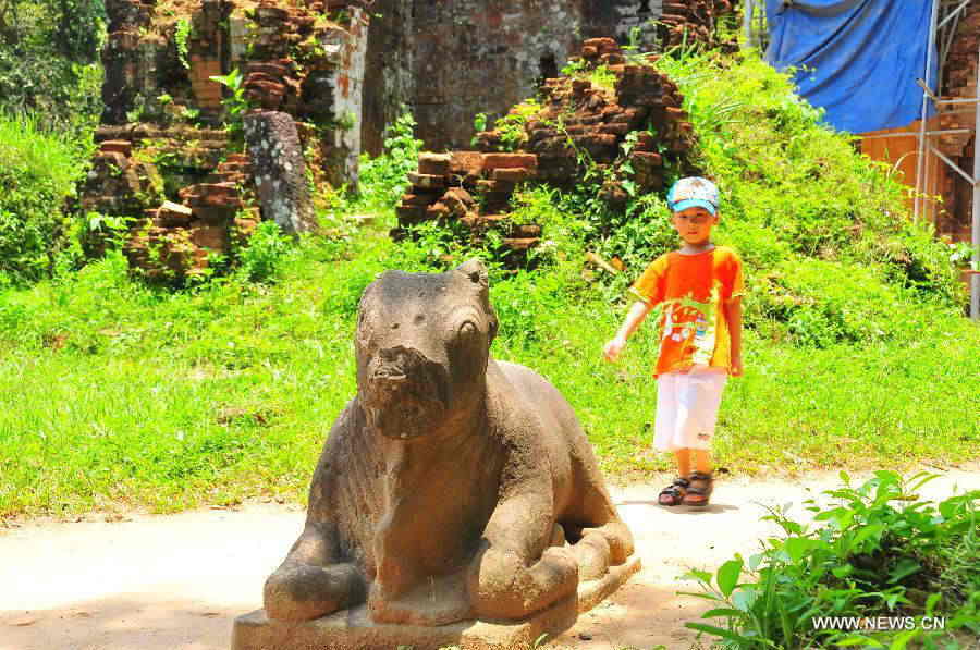 Relics of My Son Sanctuary, which was badly wrecked during last century's Vietnam War, is seen in central Vietnam, on April 29, 2013. Between the 4th and 13th centuries, a unique culture which owed its spiritual origins to Indian Hinduism developed on the coast of contemporary Vietnam. It was graphically illustrated by the remains of a series of impressive tower-temples located in My Son that was the religious and political capital of the Champa Kingdom for most of its existence. My Son Sanctuary was inscripted in UNESCO's World Cultural Heritage list in 1999. (Xinhua/Zhang Jianhua) 