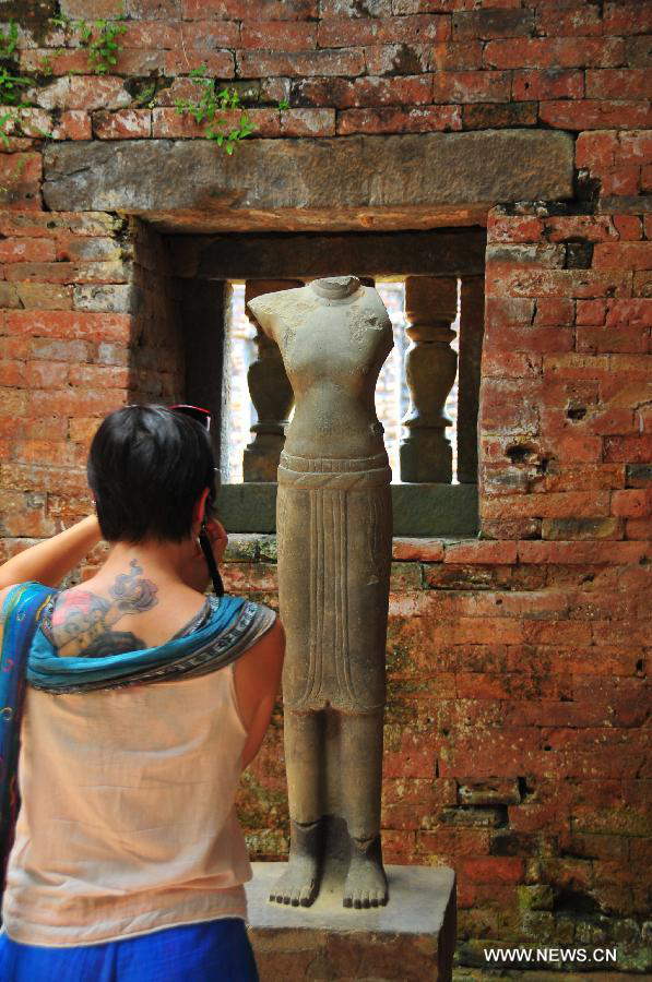 A piece of stonework exhibited in the relics of My Son Sanctuary is seen in central Vietnam, on April 29, 2013. Between the 4th and 13th centuries, a unique culture which owed its spiritual origins to Indian Hinduism developed on the coast of contemporary Vietnam. It was graphically illustrated by the remains of a series of impressive tower-temples located in My Son that was the religious and political capital of the Champa Kingdom for most of its existence. My Son Sanctuary was inscripted in UNESCO's World Cultural Heritage list in 1999. (Xinhua/Zhang Jianhua) 