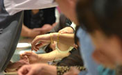 Customers pack store to buy gold in Beijing