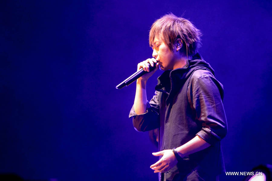 Ashin, lead singer of pop band Mayday from southeast China's Taiwan, performs during a charity concert in Guangzhou, capital of Guangdong Province, late May 2, 2013. (Xinhua Photo)