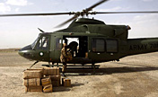 Pakistani soldiers carry electoral materials