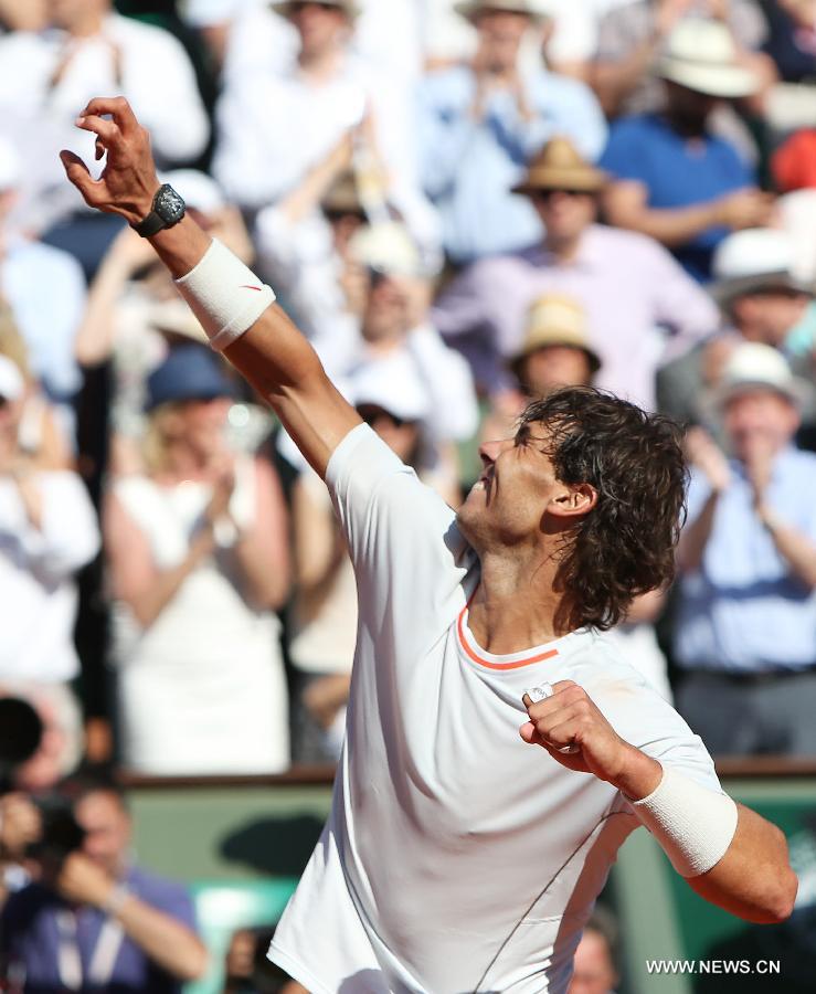 Rafael Nadal of Spain celebrates during the men's singles semi-final match against Novak Djokovic of Serbia at the French Open tennis tournament in Paris June 7, 2013. Nadal won 3-2. (Xinhua/Gao Jing)