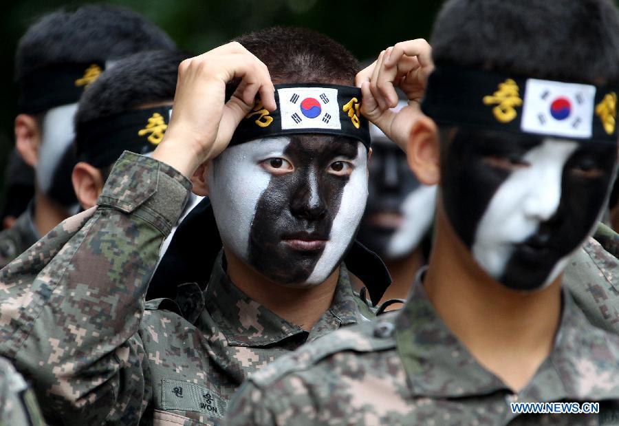 South Korean soldiers take part in an anti-terror exercise in Incheon, South Korea, June 13, 2013. South Korean military, police and government missions participated in the anti-terror exercise, part of the 4th Asian Indoor&Martial Arts Games Incheon. (Xinhua/Park Jin-hee)