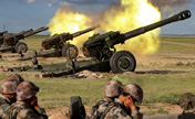 Officers and men in live-ammunition firing drill