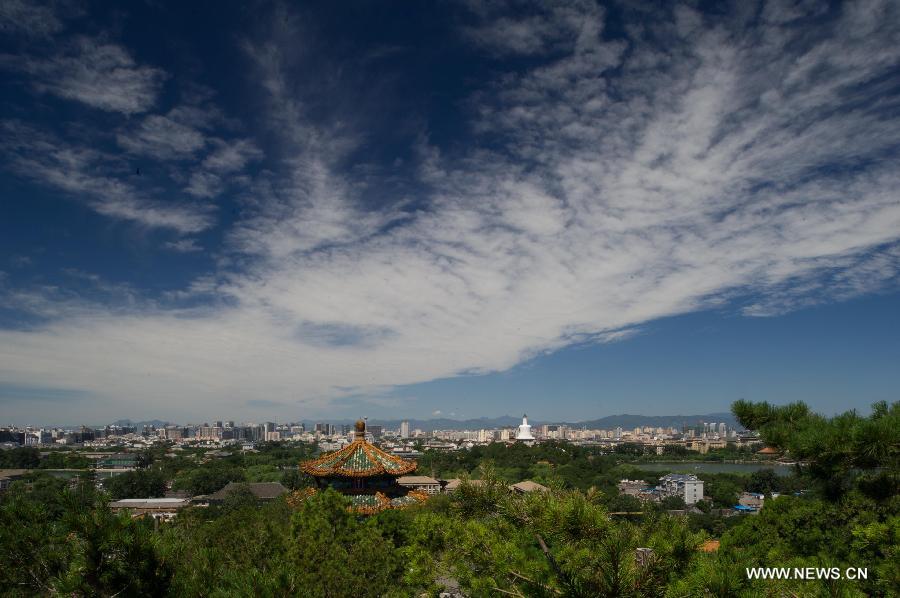 Photo taken on July 2, 2013 shows the scenery viewed at Jingshan Park in Beijing, capital of China. A rainstorm on Monday night brought Beijing with fine weather. (Xinhua/Luo Xiaoguang) 