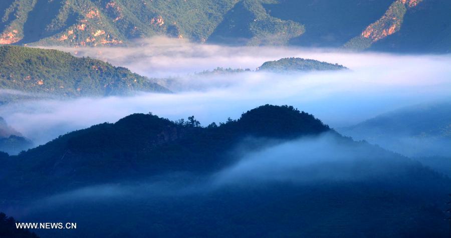 Photo taken on July 3, 2013 shows the scenery of the mountainous areas in Liulimiao Village of Huairou District, Beijing, capital of China. (Xinhua/Bu Xiangdong)  