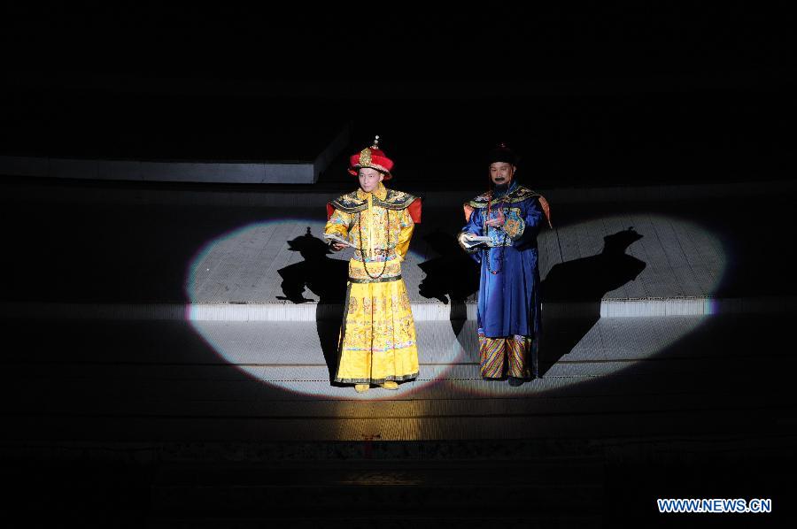 Kangxi ceremony is performed in Chengde, north China's Hebei Province, July 11, 2013. The show depicts the stories of Kangxi (1654-1722), the fourth emperor of ancient China's Qing Dynasty (1644-1911). During the reign of Kangxi, China witnessed a strong and prosperous period. Kangxi ceremony has run for 218 performances and has drwan nearly 200,000 viewers since its premiere in June 2011. (Xinhua/Wang Min)