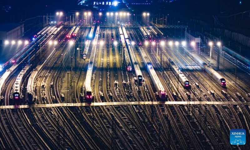 An aerial drone photo taken on Jan. 25, 2024 shows bullet trains at Guiyang North bullet train maintenance station in Guiyang, southwest China's Guizhou Province. The Spring Festival, China's biggest traditional festival, will fall on Feb. 10, while the Spring Festival travel rush, usually a period of high transportation demand as people return home for family reunions, will run from Jan. 26 to March 5.(Photo: Xinhua)